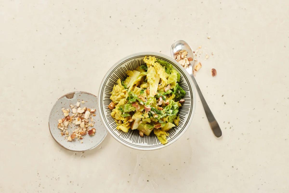 Curry de chou frisé aus der Kategorie Gemüse. Das fertige Gericht schön angerichtet und fotografiert aus Vogelperspektive (Food Fotografie). Serviervorschlag, Original Tiptopf Rezept, aus dem bekanntesten Kochbuch der Schweiz